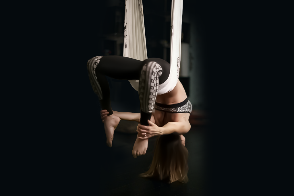 Charlie Rione guiding a personalized Pilates session for core strength